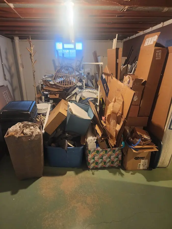 Roll-off dumpster container at job site for Concrete Dumpster Rental in Sanford